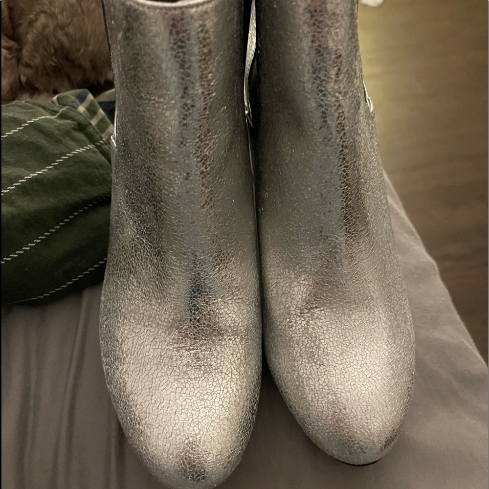 Size 9 silver pull on booties by Mia